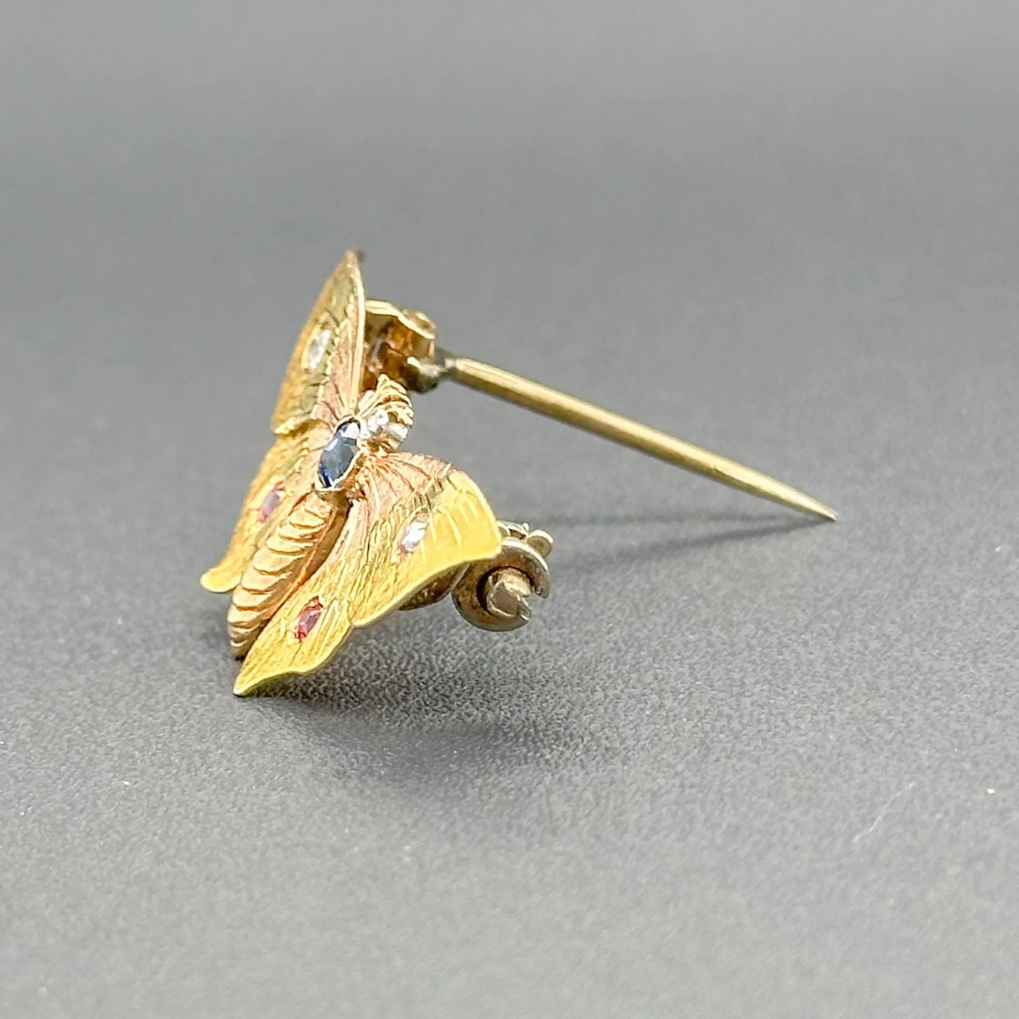 Estate 13K Tri-Color Gold 0.06cttw Ruby. 0.09ct Sapphire. 0.06cttw H-I/SI1 Diamond Butterfly Pin